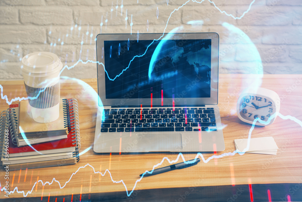 Double exposure of graph and financial info and work space with computer background. Concept of international online trading. Double exposure of graph and financial info and work space with computer background. Concept of international online trading.