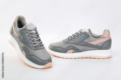 Shoes for the sport .Gray comfortable shoes on a white background