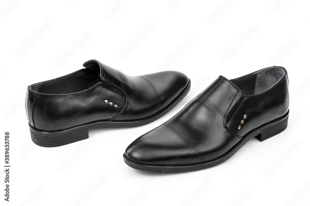 Classic black leather shoes on a white background Classic black leather shoes on a white background