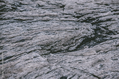 Grey granit rock surface closeup