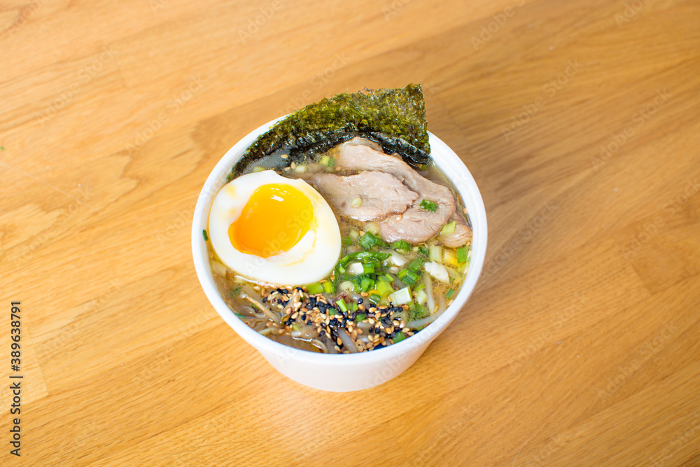 Bowl of Hot and Sour Beef Broth With Spinach Ramen Noodles Bowl of Hot and Sour Beef Broth With Spinach Ramen Noodles