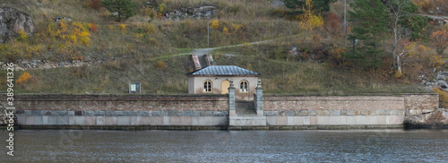 Old quay at the passage Oxdjupet in the Stockholm archipelago photo