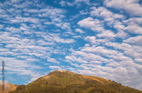 Long exposure landscape of the Pichincha volcano peak at sunrise, Andes mountains, Quito, Ecuador.