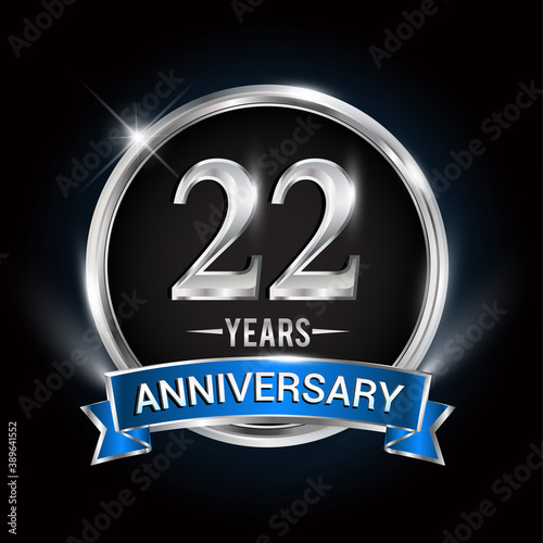 Celebrating 22nd years anniversary logo with silver ring and blue ribbon.