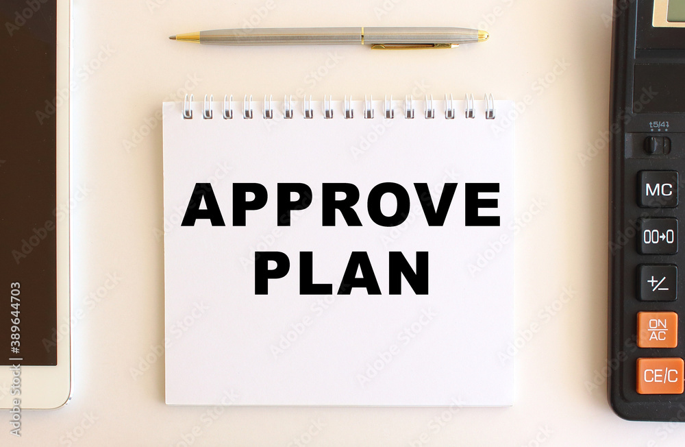 Notepad with text APPROVE PLAN on a white background. Business concept. Notepad with text APPROVE PLAN on a white background. Business concept.