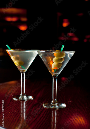 Old Fashioned Cocktail. Traditional American craft cocktails made by artisanal bartenders or mixologists in speakeasy   upscale bars or dive bar taverns. Cocktails served in chilled cocktail glass.