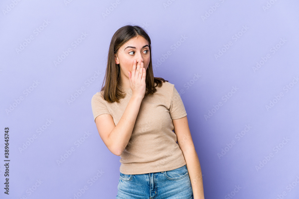 Young caucasian woman being shocked because of something she has seen. Young caucasian woman being shocked because of something she has seen.