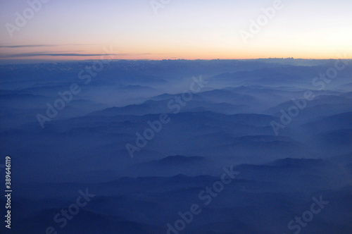 View landscape and cloudscape sky with sunrise skyline from airbus flying from thailand go to Berlin, Germany © tuayai
