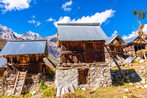 View of Chitkul village, this has wooden Huts of Kinnauri architecture  which is a popular tourist destination among backpacker & nature lovers for its natural beauty of Himalayas in Kinnaur region. photo