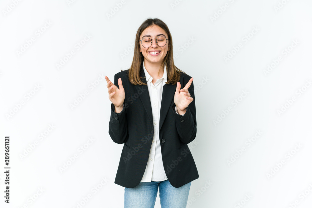 Young caucasian business woman joyful laughing a lot. Happiness concept. Young caucasian business woman joyful laughing a lot. Happiness concept.