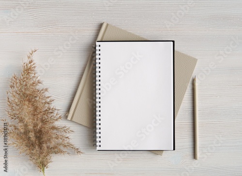 Empty spiral notebook mockup for planner template, art, lettering or text, wedding planner, neutral colors, flat lay.