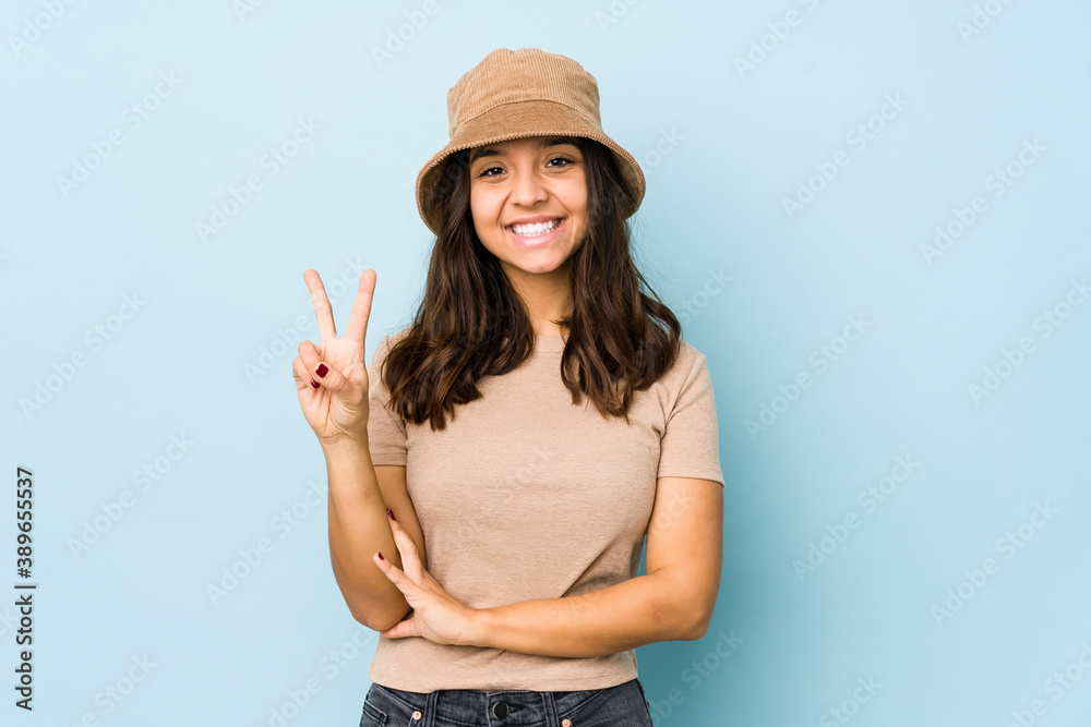 Young mixed race hispanic woman isolated showing number two with fingers. Young mixed race hispanic woman isolated showing number two with fingers.