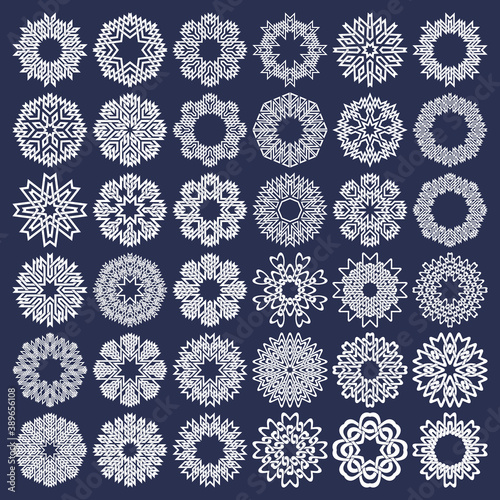 Set of eight pointed circular patterns in intertwined lines style. Thirty six white snowflakes on blue background.