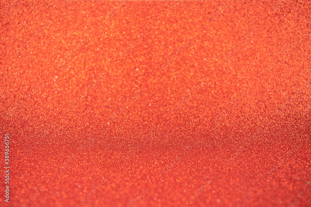 Fototapeta premium Abstract orange background, glitter or bokeh lights. Round defocused particles.