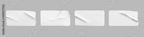 White glued crumpled rectangle stickers mock up set. Blank white adhesive paper or plastic sticker label with wrinkled and creased effect. Template label tags close up. 3d realistic vector
