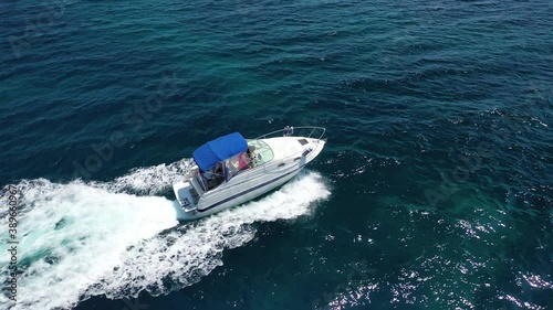 Wallpaper Mural Aerial drone tracking video of speed boat cruising in high speed in deep blue Aegean sea Torontodigital.ca