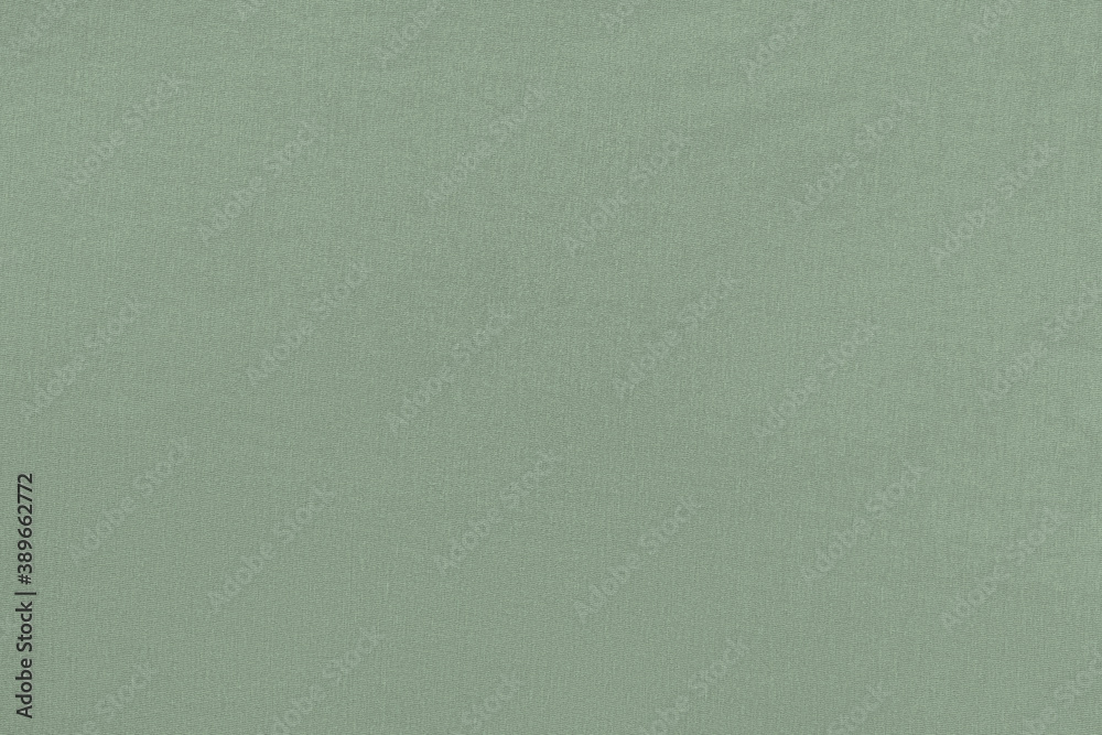 Gray green homogeneous background with a textured surface Gray green homogeneous background with a textured surface