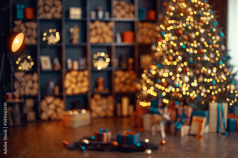 Beautiful holiday decorated room with Christmas tree, out of focus shot for photo background.