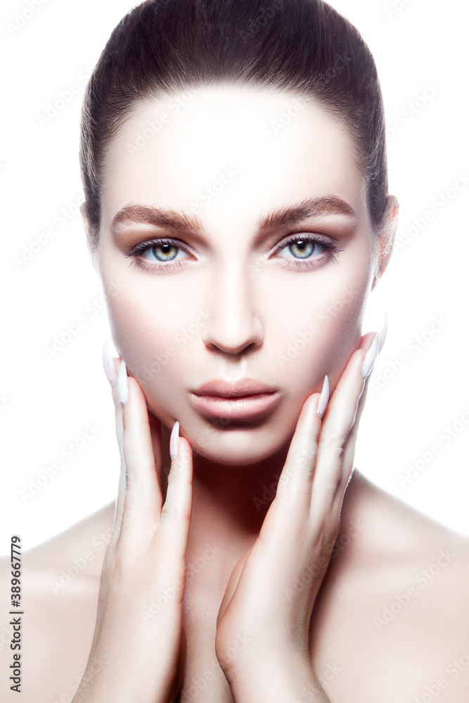 Close-up beauty face of young model woman touching healthy perfect skin. Sensual face lips, finger near mouth, blue eyes Close-up beauty face of young model woman touching healthy perfect skin. Sensual face lips, finger near mouth, blue eyes