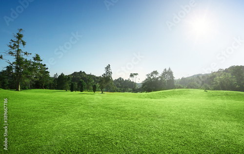 Sunrise golf course with blue sky