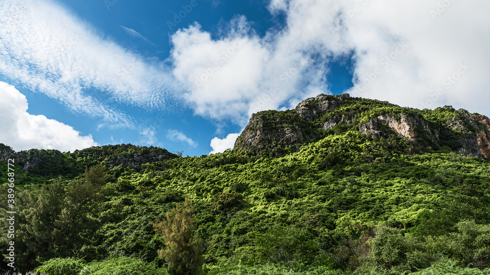 Mountains, cliffs and blue skies in the rainy season of Thailand.