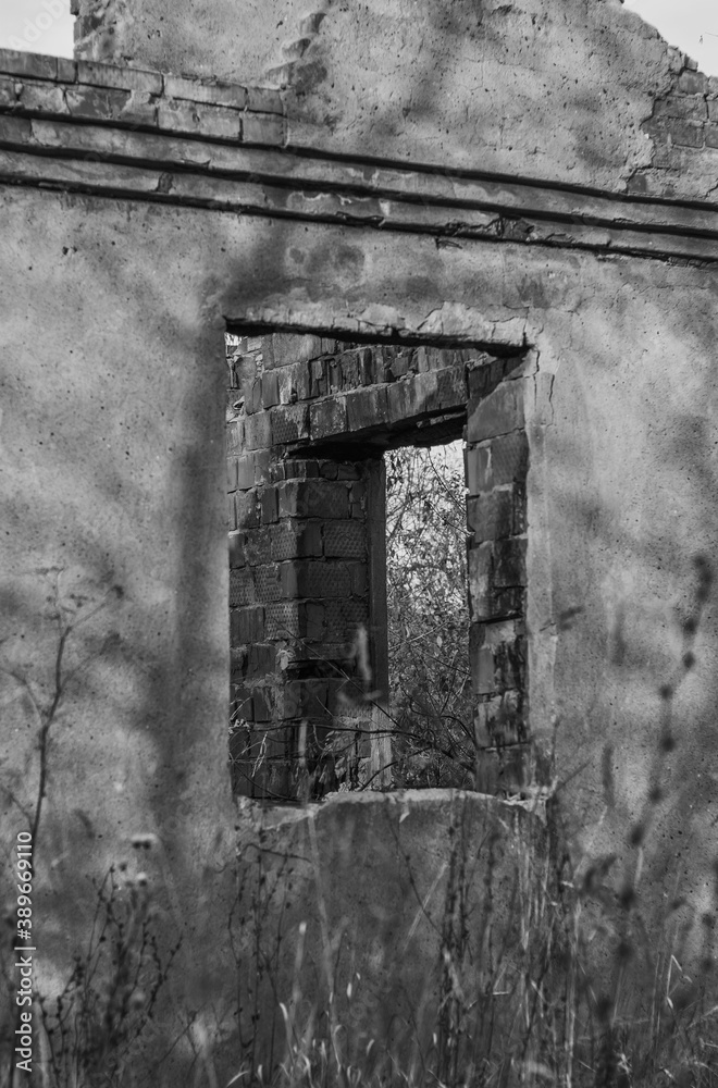 Fototapeta premium Sunny day. Abandoned building window