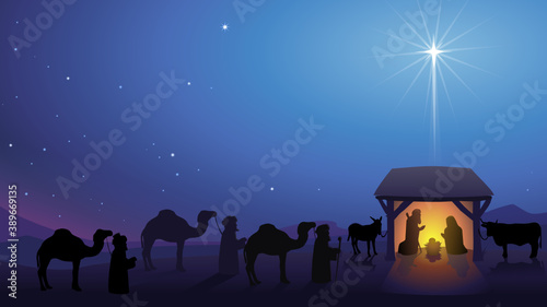 Shining star landscape above the nativity scene in bethlehem with the approach of the three wise men photo