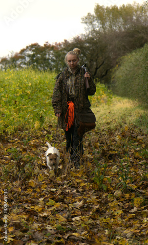 woman hunting with Jack Russell terrier © Poul