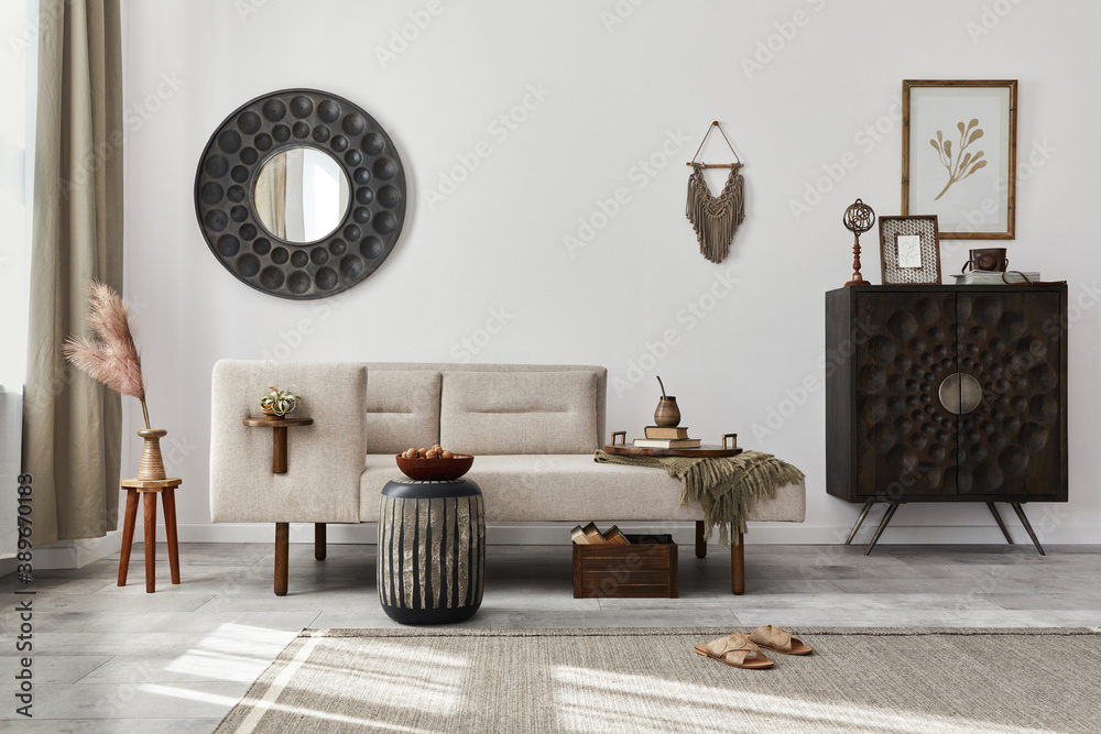 Modern ethnic living room interior with design chaise lounge, round mirror, furniture, carpet, decoration, stool and elegant personal accessories. Template. Stylish home decor. Modern ethnic living room interior with design chaise lounge, round mirror, furniture, carpet, decoration, stool and elegant personal accessories. Template. Stylish home decor.