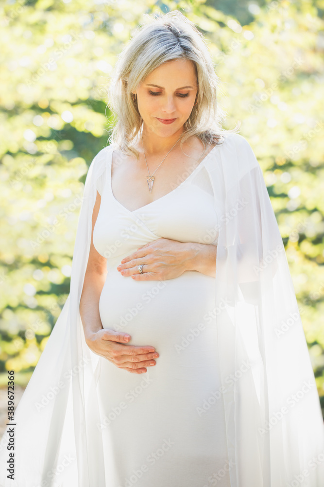 Beautiful Pregnant Woman at the Park Beautiful Pregnant Woman at the Park