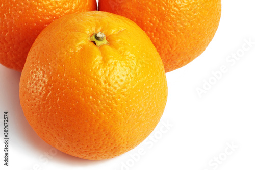 A group of fresh oranges isolate on a white background. Top view. closeup