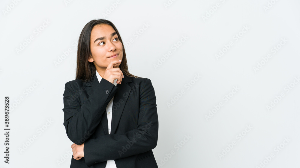 Young asian bussines woman isolated on white background looking sideways with doubtful and skeptical expression. Young asian bussines woman isolated on white background looking sideways with doubtful and skeptical expression.