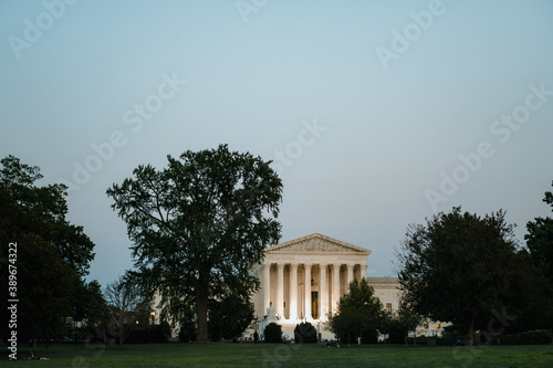 Supreme Court of the United States building at dusk with illumination
