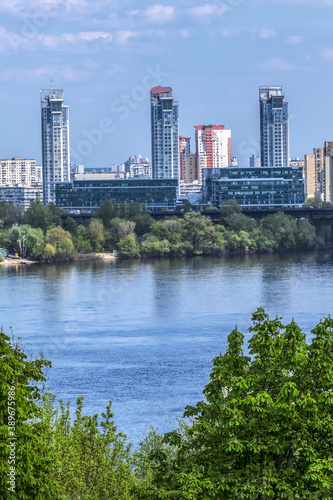 View of Dnieper River with Paton Bridge and architecture of Left Bank of Dnieper in Kyiv. Kyiv  Ukraine.