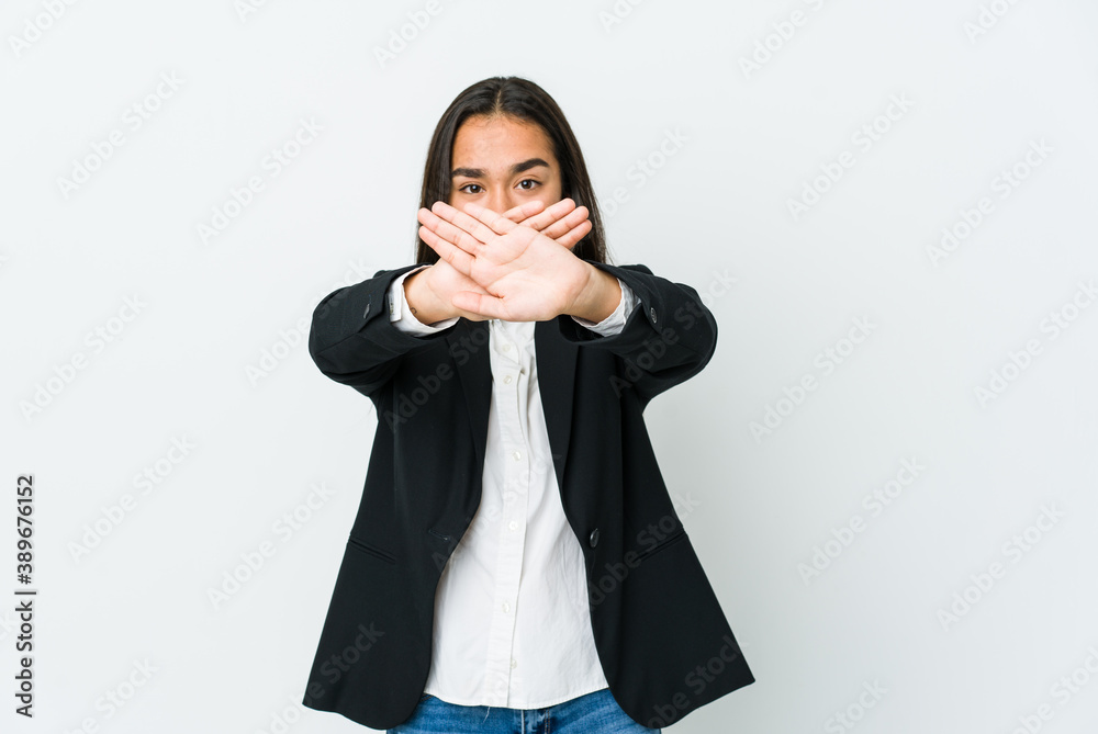 Young asian bussines woman isolated on white background doing a denial gesture Young asian bussines woman isolated on white background doing a denial gesture