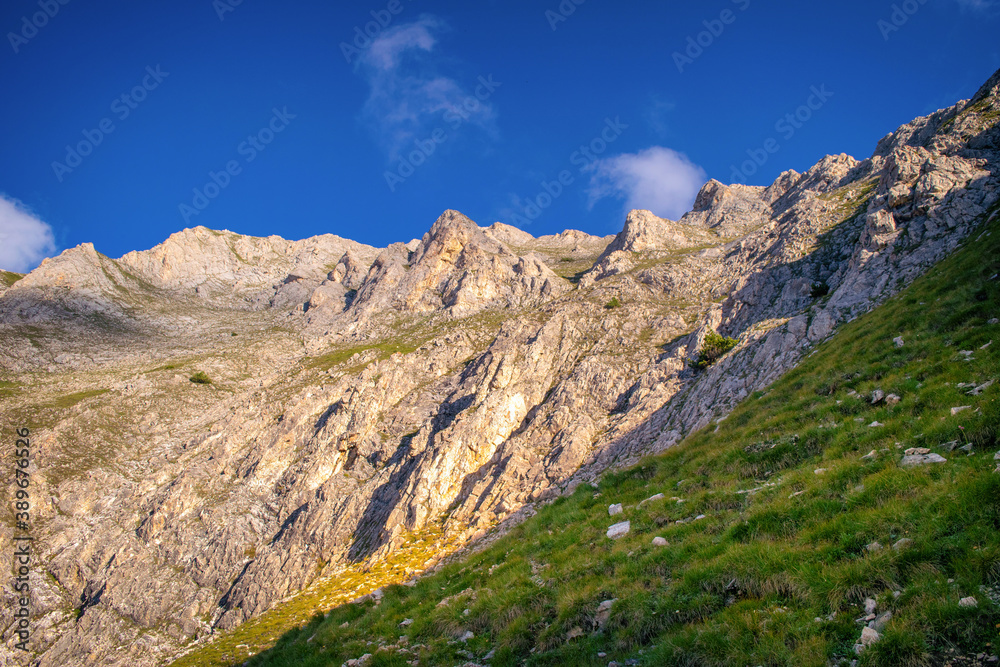 Hiking to Koncheto, view across the peaks of the Pirin Mountains in Bulgaria with Vihren, Kutelo,Todorka,Banski Suhodol , National Park Pirin with company of wild goats