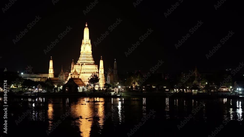 Wat Arun Temple with Chao Phraya river at night in Bangkok, Thailand Wat Arun Temple with Chao Phraya river at night in Bangkok, Thailand
