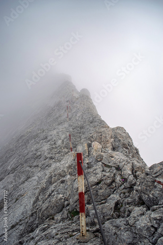 Hiking to Koncheto, view across the peaks of the Pirin Mountains in Bulgaria with Vihren, Kutelo,Todorka,Banski Suhodol , National Park Pirin with company of wild goats photo