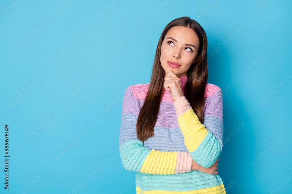 Portrait of pretty smart minded brown-haired focused girl overthinking making decision copy space isolated over bright blue color background Portrait of pretty smart minded brown-haired focused girl overthinking making decision copy space isolated over bright blue color background