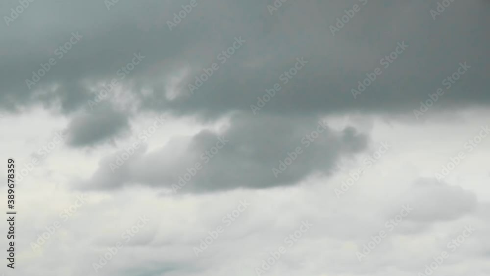 A time-lapse shot with clouds moving backwards. A time-lapse shot with clouds moving backwards.