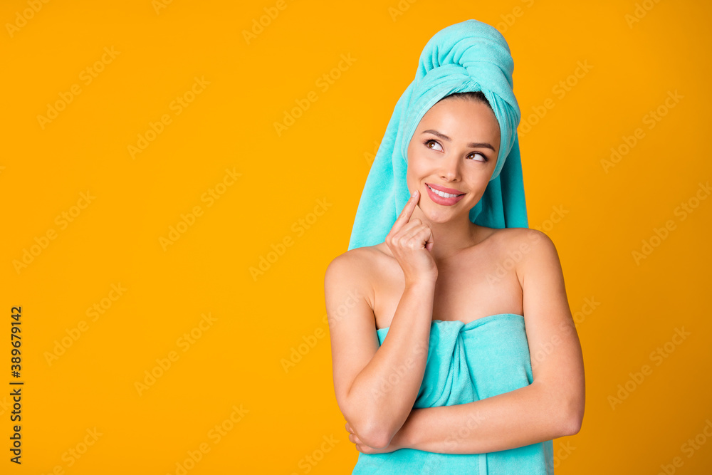 Photo of aesthetic attractive person finger on chin look empty space teal towel isolated on yellow color background Photo of aesthetic attractive person finger on chin look empty space teal towel isolated on yellow color background