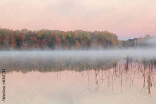 Autumn landscape at dawn of Moccasin Lake in fog, Hiawatha National Forest, Michigan's Upper Peninsula, USA