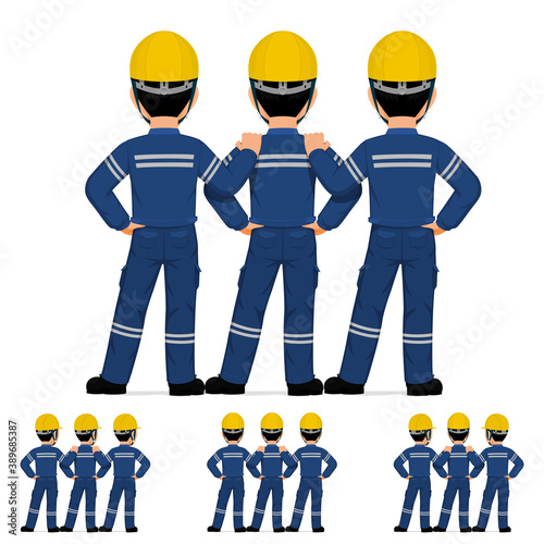 Three industrial worker standing together on white background