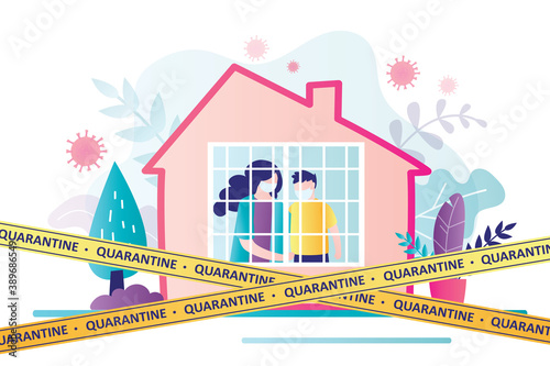Mom and son sit on forced self-isolation. House is covered with warning yellow tapes. Concept of coronavirus and healthcare