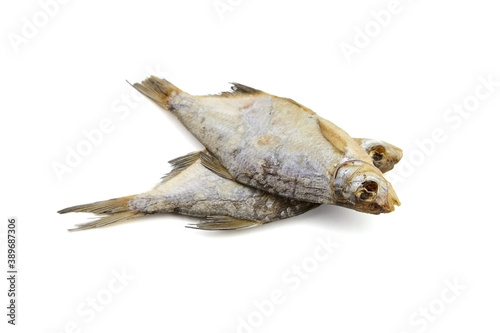 Two dry fish isolated on white background.