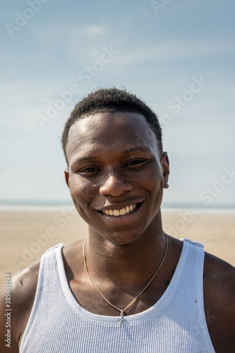 Portrait of a Smiling Man on the Beach