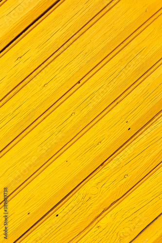 background of wooden boards painted with yellow paint
