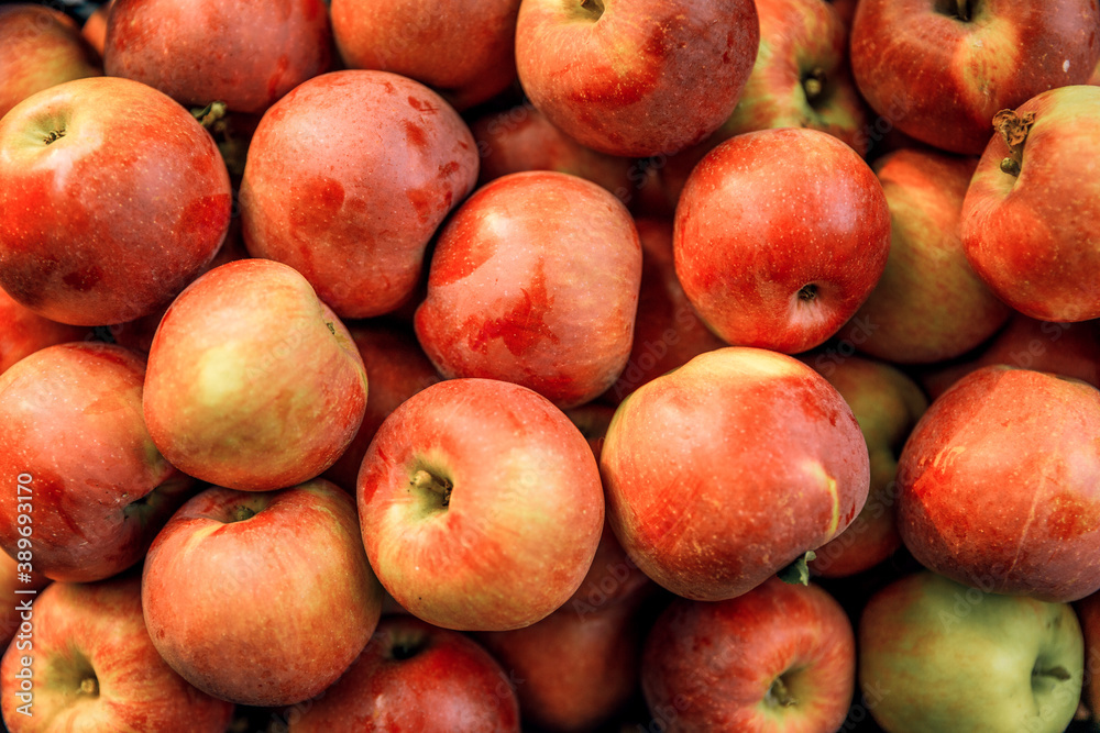 Fresh ripe red apples in the background Fresh ripe red apples in the background