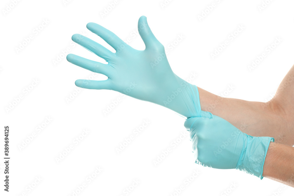 Doctor hands with blue surgical gloves isolated on white background. Medical staff protective gear against coronavirus COVID 19. Health care. Protection concept