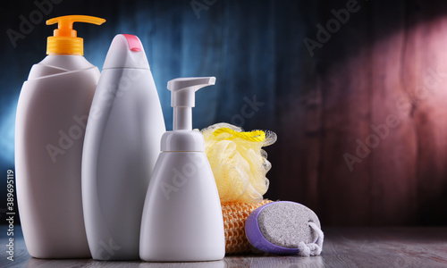 Plastic contaiers of shampoos and shower gels photo